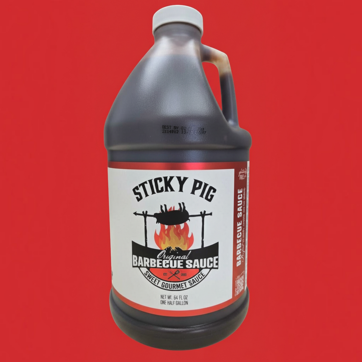 Sticky Pig BBQ Original sweet gourmet barbecue sauce in a large 64 oz plastic jug against a solid red background.