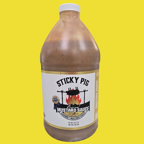 Sticky Pig BBQ original mustard sauce in a 64-ounce plastic jug with a white cap against a yellow background.